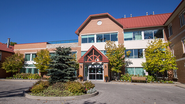 image of front entrance of Bloomington Cove Care Community in Stouffville